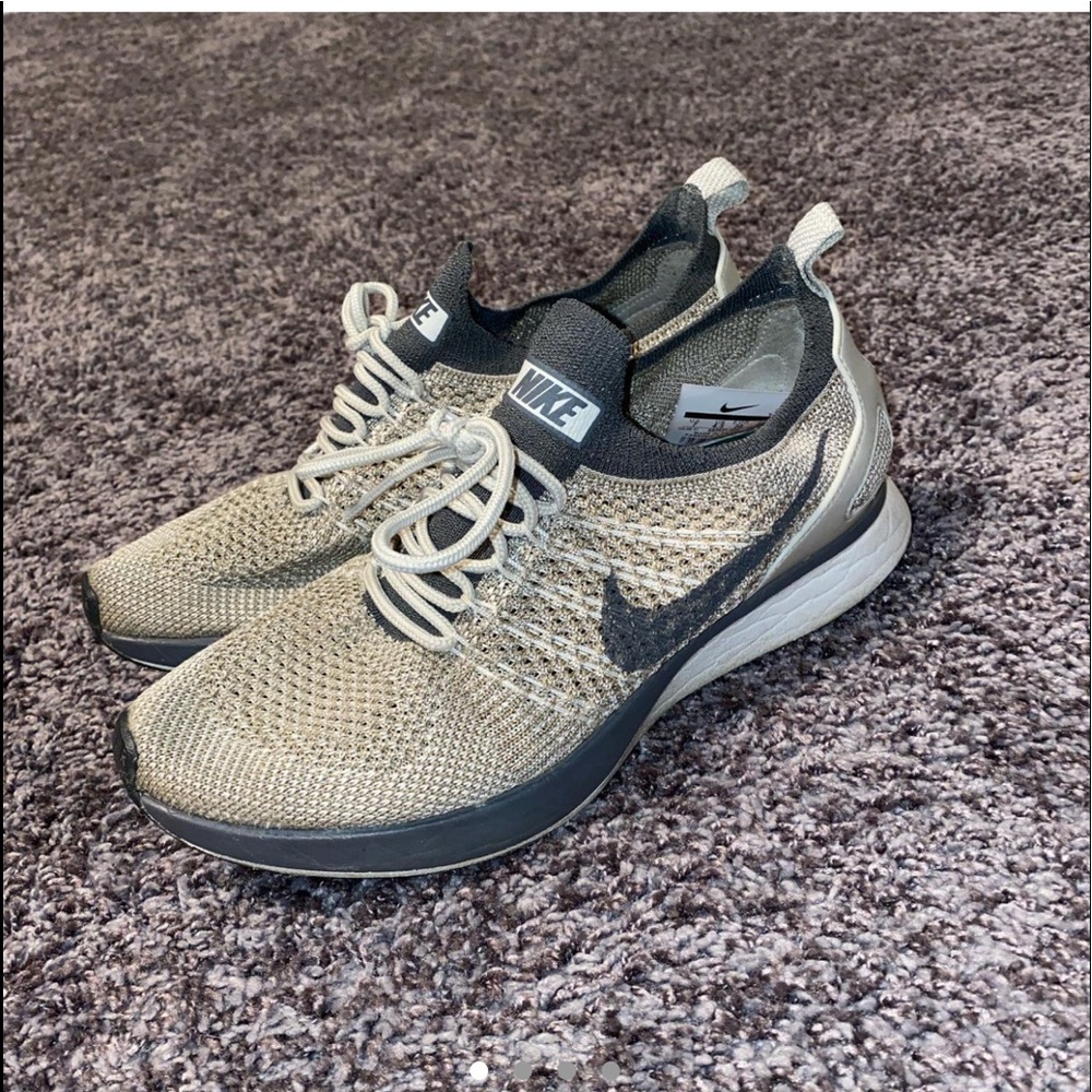 silver and grey nike flyknits